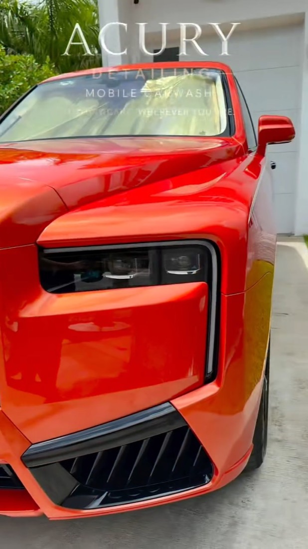 Freshly detailed orange Rolls-Royce Spectre